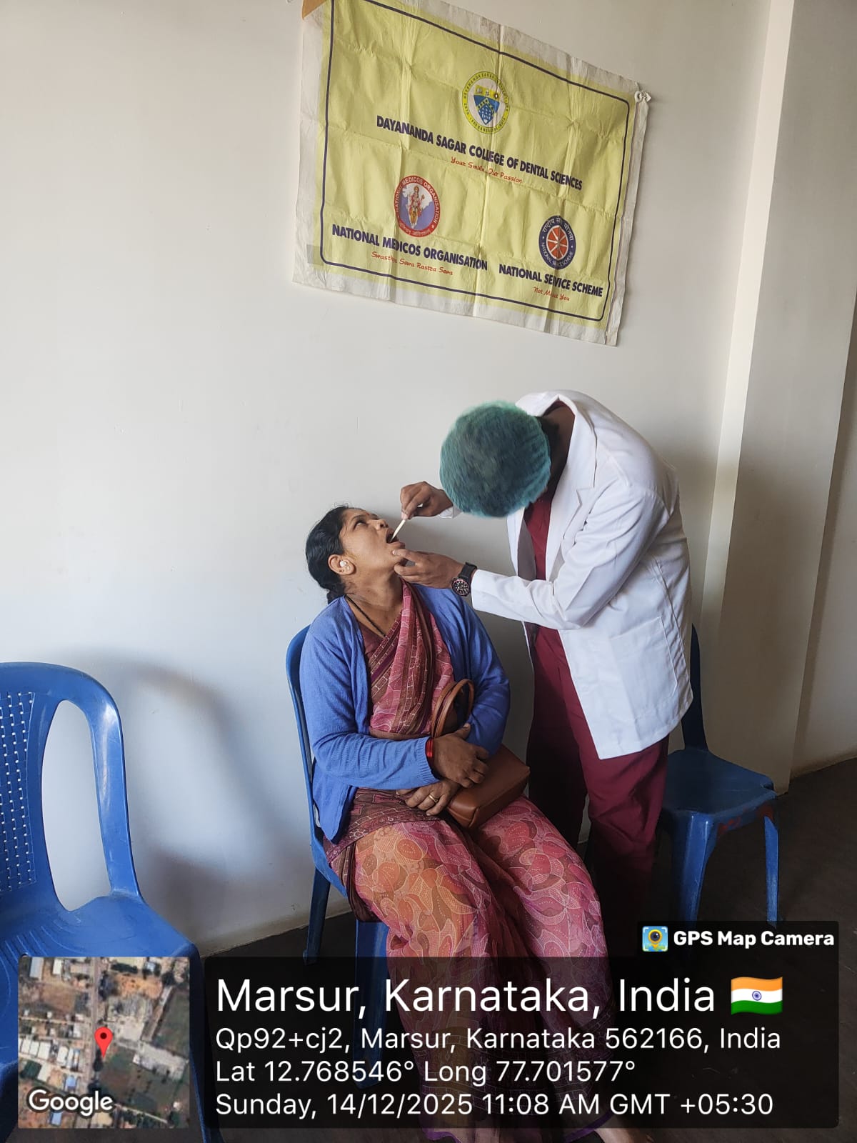 Patient receiving dental screening from a dentist